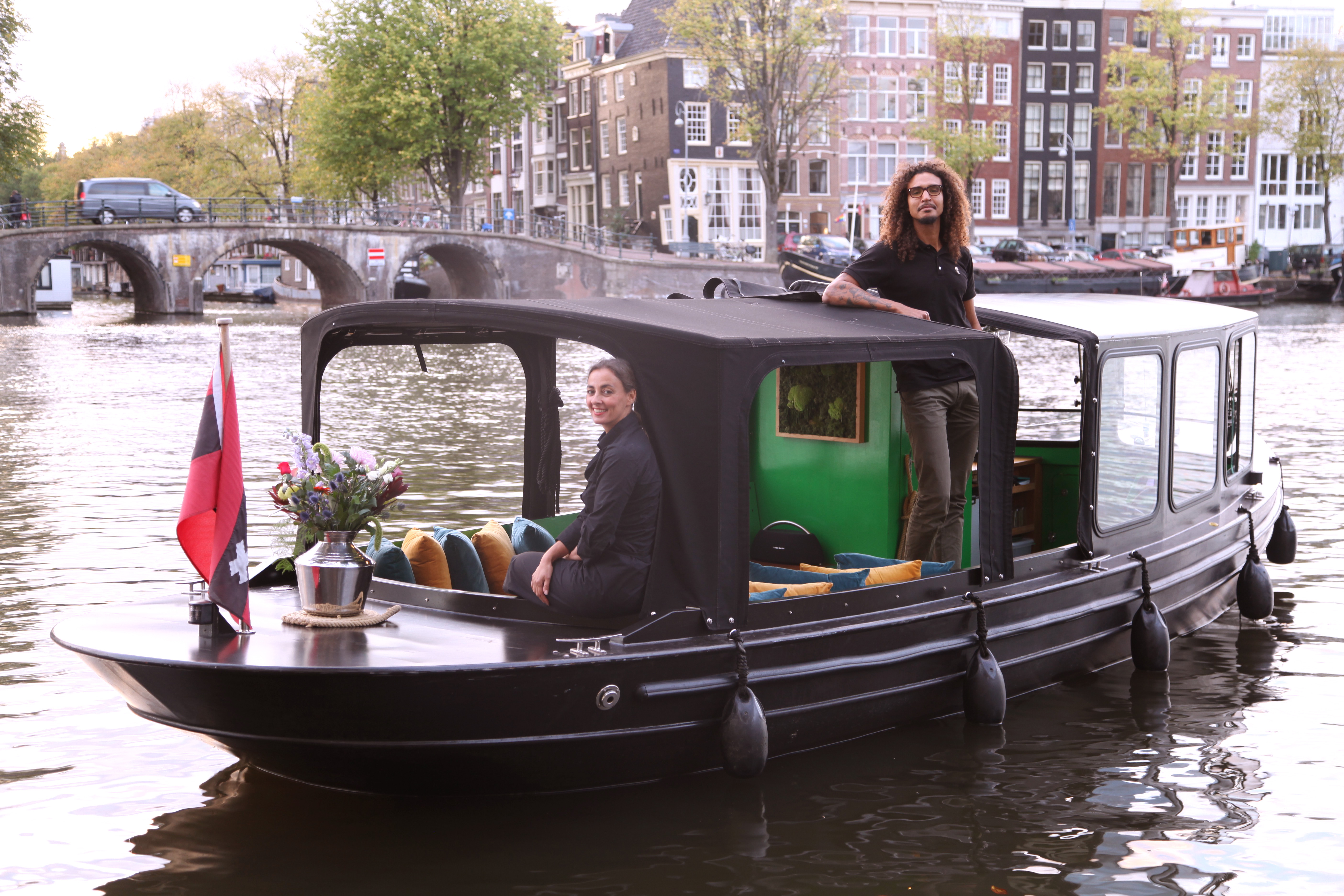 Our boat cruising through the canals of Amsterdam